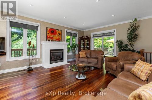 7 Limbert Road, Mcdougall, ON - Indoor Photo Showing Living Room With Fireplace