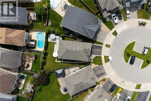 Aerial perspective of a residential community with a central cul-de-sac - 916 Steepleridge Court, Kitchener, ON - Outdoor With View