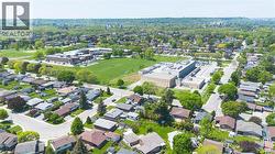 Aerial perspective showcasing a residential area with varied housing styles - 