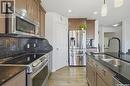 106 Wilkins Crescent, Saskatoon, SK  - Indoor Photo Showing Kitchen With Double Sink With Upgraded Kitchen 