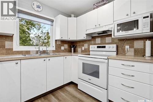 90 Edenwold Crescent, Regina, SK - Indoor Photo Showing Kitchen With Double Sink