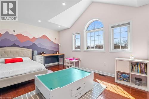 Vaulted ceiling, recessed lighting, and rich wood-finish flooring - 12 Buman Court, Barrie, ON - Indoor Photo Showing Bedroom