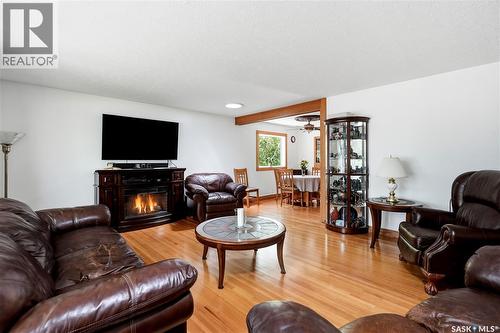 104 Marsh Crescent, Regina, SK - Indoor Photo Showing Living Room With Fireplace