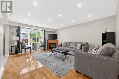 21 Hawkswood Drive, Kitchener, ON - Indoor Photo Showing Living Room With Fireplace