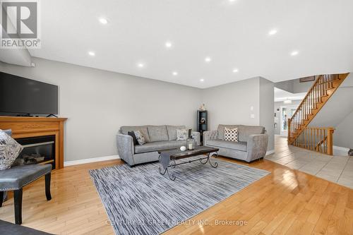 21 Hawkswood Drive, Kitchener, ON - Indoor Photo Showing Living Room With Fireplace