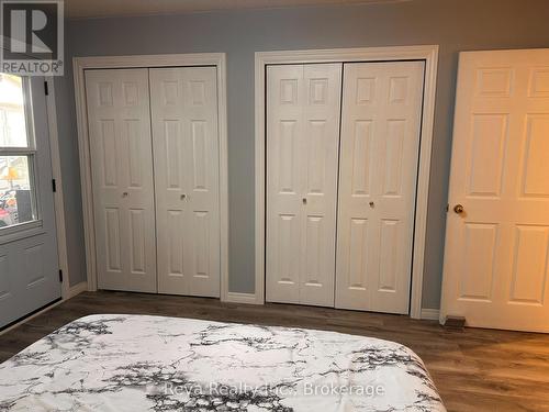 Primary Bedroom with Double Closets - 11 Ridge Road, Bancroft (Bancroft Ward), ON - Indoor Photo Showing Bedroom