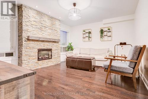 2 Studebaker Trail, Brampton, ON - Indoor Photo Showing Living Room With Fireplace