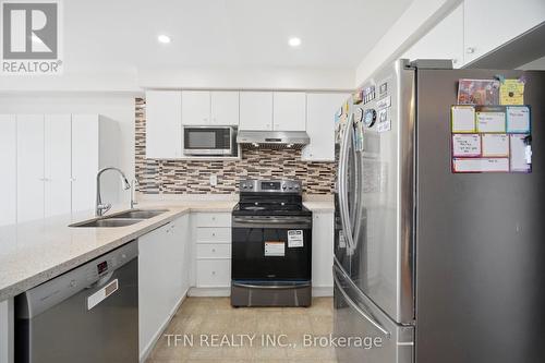123 Brickyard Way, Brampton, ON - Indoor Photo Showing Kitchen With Double Sink