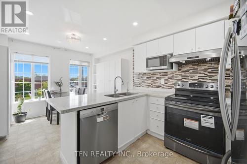 123 Brickyard Way, Brampton, ON - Indoor Photo Showing Kitchen With Double Sink