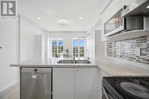 123 Brickyard Way, Brampton, ON - Indoor Photo Showing Kitchen With Double Sink