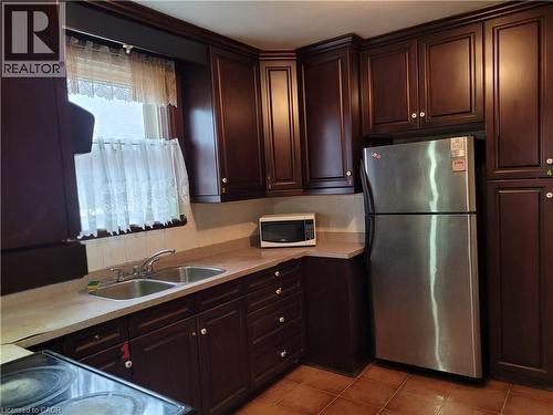49 West 3Rd Street, Hamilton, ON - Indoor Photo Showing Kitchen With Double Sink