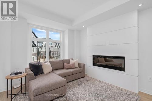 48 Brandon Crescent, New Tecumseth, ON - Indoor Photo Showing Living Room With Fireplace
