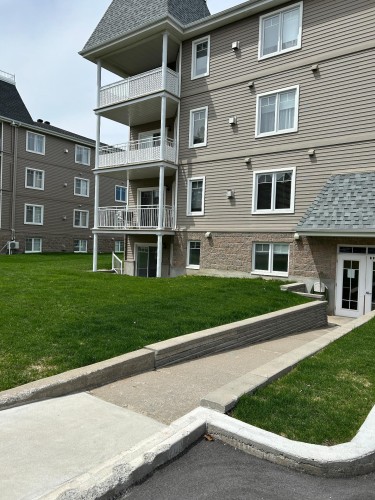 Back of Structure - 103-2515 Rue Dutrisac, Vaudreuil-Dorion, QC - Outdoor