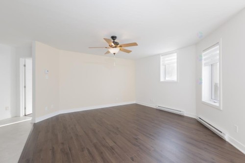 Living Room - 103-2515 Rue Dutrisac, Vaudreuil-Dorion, QC - Indoor Photo Showing Other Room