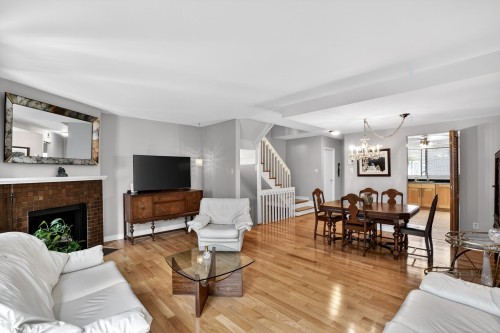 Salon - 927 Place Soulanges, Brossard, QC - Indoor Photo Showing Living Room With Fireplace