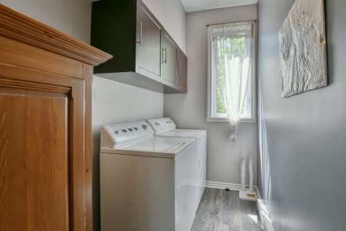 Salle de lavage - 14 Rue Boréale, Saint-Hippolyte, QC - Indoor Photo Showing Laundry Room