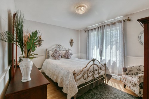 Chambre à coucher principale - 14 Rue Boréale, Saint-Hippolyte, QC - Indoor Photo Showing Bedroom