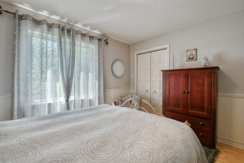 Chambre à coucher principale - 14 Rue Boréale, Saint-Hippolyte, QC - Indoor Photo Showing Bedroom