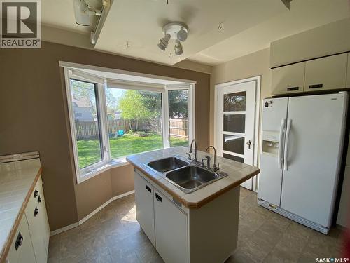 210 First Avenue, Yorkton, SK - Indoor Photo Showing Kitchen With Double Sink