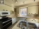 210 First Avenue, Yorkton, SK  - Indoor Photo Showing Kitchen With Double Sink 