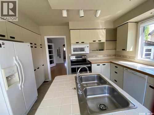 210 First Avenue, Yorkton, SK - Indoor Photo Showing Kitchen With Double Sink
