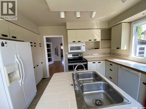 210 First Avenue, Yorkton, SK - Indoor Photo Showing Kitchen With Double Sink