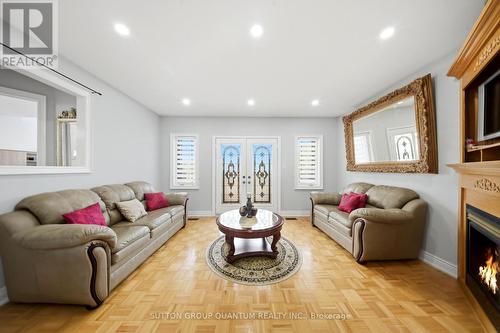 Second family room area on second level - 35 Devonsleigh Drive, Brampton, ON - Indoor Photo Showing Living Room With Fireplace