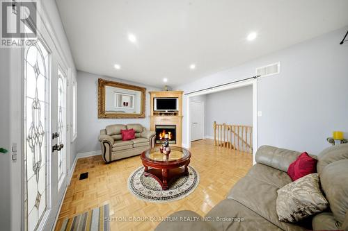 Master bedroom - 35 Devonsleigh Drive, Brampton, ON - Indoor Photo Showing Living Room With Fireplace