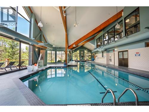105 Predator Ridge Drive Unit# 21, Vernon, BC - Indoor Photo Showing Other Room With In Ground Pool