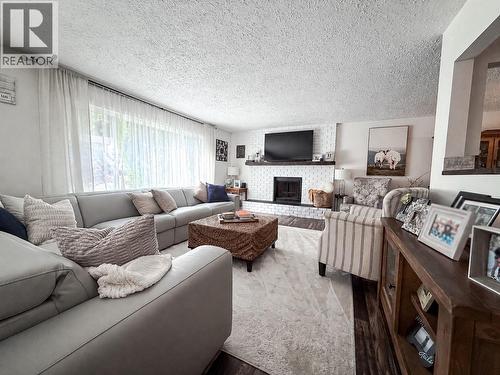2300 Mcbride Street, Trail, BC - Indoor Photo Showing Living Room With Fireplace