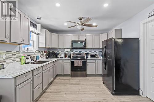 133 Station Road, Avondale, NL - Indoor Photo Showing Kitchen With Double Sink