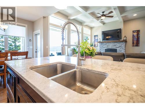 Kitchen - 132 Crown Crescent, Vernon, BC - Indoor Photo Showing Kitchen With Fireplace With Double Sink