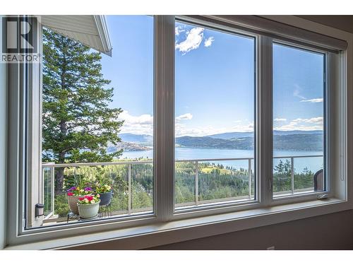 Primary bedroom has gorgeous views - 132 Crown Crescent, Vernon, BC - Indoor Photo Showing Other Room