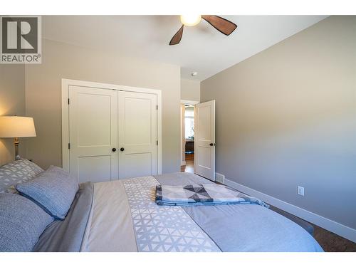 Second bedroom on main floor - 132 Crown Crescent, Vernon, BC - Indoor Photo Showing Bedroom