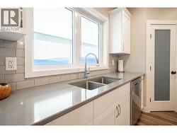 Basement suite built-in kitchen pantry - 
