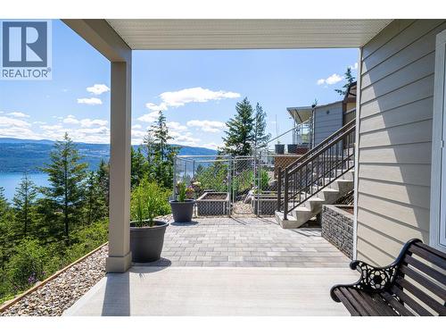 Side stairs and garden area - 132 Crown Crescent, Vernon, BC - Outdoor With Exterior