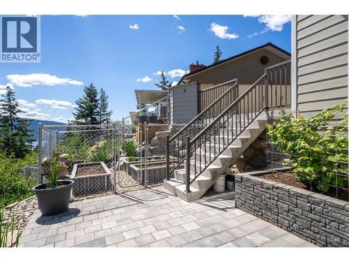 Side stairs and garden area - 132 Crown Crescent, Vernon, BC - Outdoor With Exterior