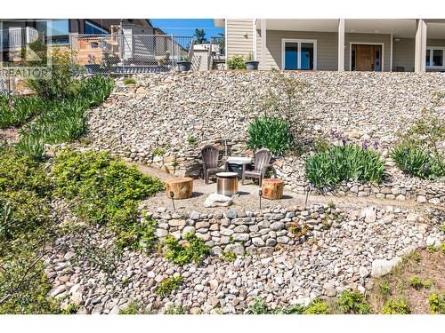 Sitting area in backyard - 132 Crown Crescent, Vernon, BC - Outdoor