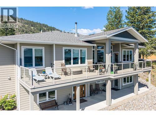 Both levels back of house - 132 Crown Crescent, Vernon, BC - Outdoor With Deck Patio Veranda