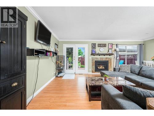2395 Pleasant Valley Road Unit# 5, Armstrong, BC - Indoor Photo Showing Living Room With Fireplace
