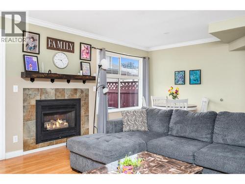 2395 Pleasant Valley Road Unit# 5, Armstrong, BC - Indoor Photo Showing Living Room With Fireplace