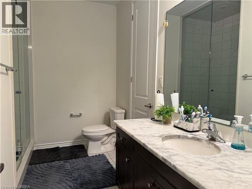 Bathroom vanity with a white-grey veined countertop and an undermount sink - 18 Dolucci Crescent, Brampton, ON - Indoor Photo Showing Bathroom