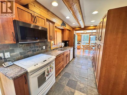 4485 Trip Road, 100 Mile House, BC - Indoor Photo Showing Kitchen With Double Sink