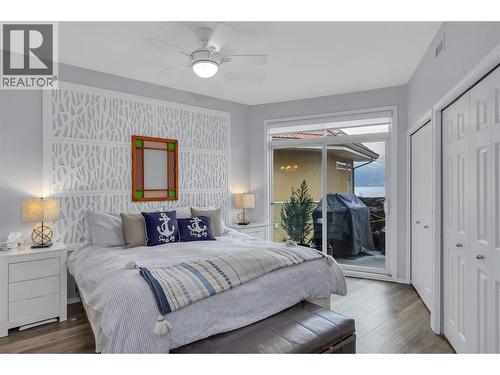 This photo has the owners furnishings but they have now been removed. - 1088 Sunset Drive Unit# 635, Kelowna, BC - Indoor Photo Showing Bedroom