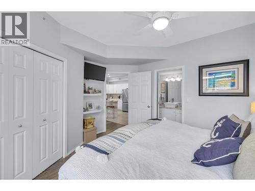 This photo has the owners furnishings but they have now been removed. - 1088 Sunset Drive Unit# 635, Kelowna, BC - Indoor Photo Showing Bedroom