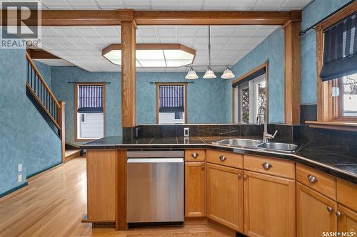 1027 4Th Street E, Prince Albert, SK - Indoor Photo Showing Kitchen With Double Sink