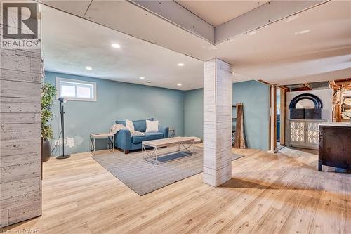 Finished lower level featuring wood-finish flooring, recessed lighting, and a light-toned wall color - 151 Winchester Boulevard, Hamilton, ON - Indoor