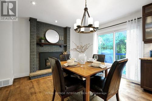 2414 Mcgee Side Road, Ottawa, ON - Indoor Photo Showing Dining Room With Fireplace
