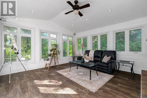 Sunroom at the back of the house - 2414 Mcgee Side Road, Ottawa, ON - Indoor Photo Showing Living Room
