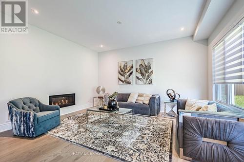 14 Richard Oxtoby Road, Caledon, ON - Indoor Photo Showing Living Room With Fireplace